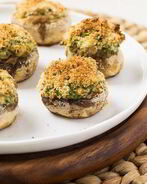 Грибы, фаршированные сыром, в духовке