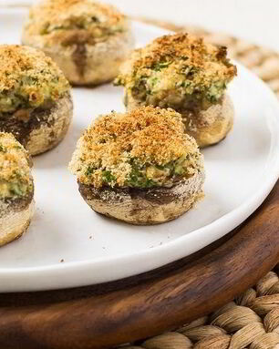 Грибы, фаршированные сыром, в духовке