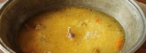 плов с курицей в утятнице на плите. Шаг 12