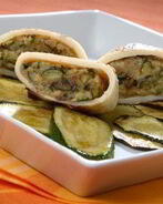 Кальмары, фаршированные цукини, грибами и картофелем