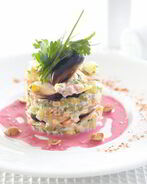 Оливье с мидиями под свекольным соусом