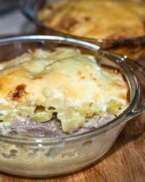 Картошка под шубой в духовке со свининой