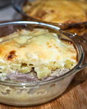 Картошка под шубой в духовке со свининой