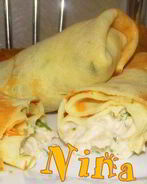 Блинчики фаршированные курицей с соусом Бешамель