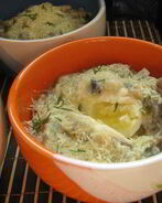 Яйца с рисом, запеченные в соусе из шампиньонов